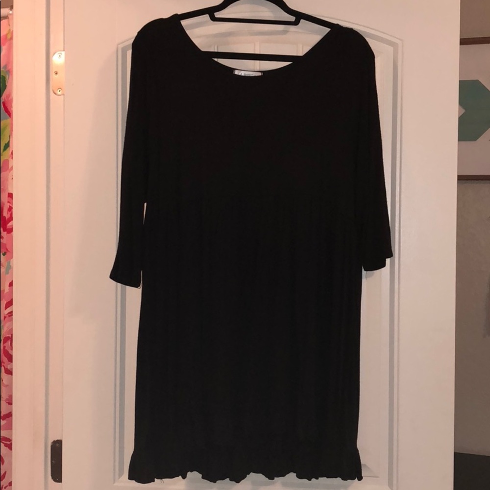 Simple Black Dress with Ruffle Bottom